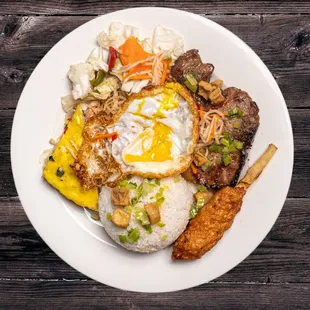 a plate of food on a wooden table