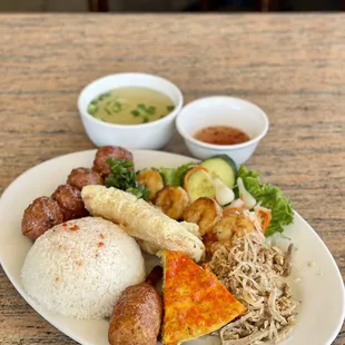 Com Tam $20.95 ~ Rice with Broiled Meatballs, Fried Shrimp Cake, Shredded Pork Skin, Egg Cake, BBQ Shrimp &amp; Grilled Shrimp Meat on Sugarcane