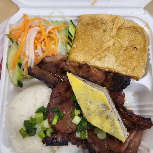 Porkchop with shrimp paste bean curd and egg cake over rice