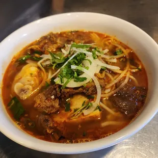 Beef soup w noodles.