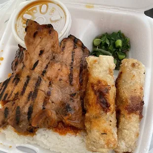 Grilled pork with shrimp egg rolls broken rice plate