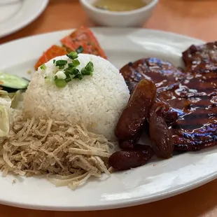 Grilled pork chop with broken rice and julienned pork and steamed pork egg cake. (#28)