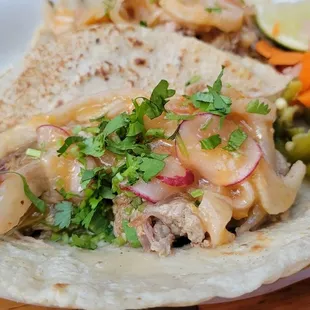 Berkshire pork carnitas , fennel - orange claw , salsa verde