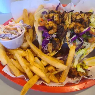 Blacked shrimp tacos and fries