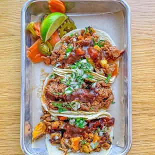 Grilled chicken taco, beef taco, berkshire pork al pastor taco