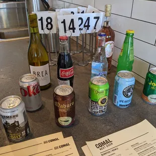 a number of beverages on a counter