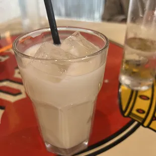 a drink with ice in a glass