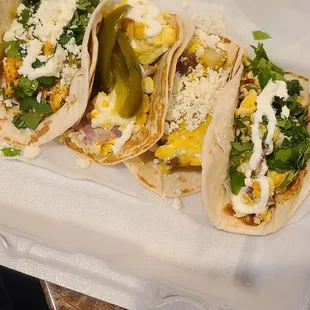 Potato and egg, chorizo and egg, bacon and egg, sausage and egg tacos. Not in that order