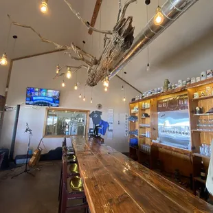 a bar with a long wooden table