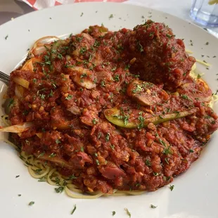 Angel hair pasta with tomato bacon sauce