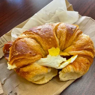 Bacon, egg, and cheese croissant sandwich for dine-in.