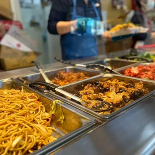 a buffet with a variety of food items