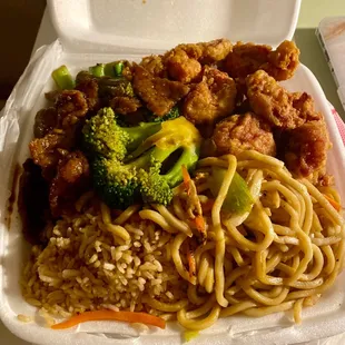 Combo with half fried rice, half chow mein, beef broccoli, and Chicken with Spicy Salt