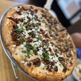 Al pastor and carne asada pizza.