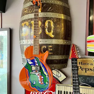 a guitar and a beer barrel