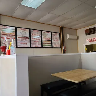a table and bench in a restaurant