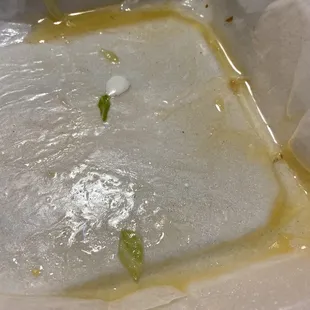 a piece of food in a plastic container