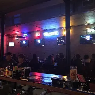 people sitting at the bar