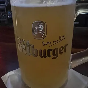 a glass of beer on a table