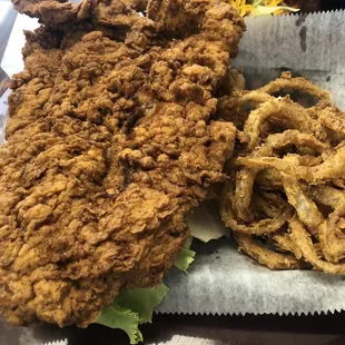 Pork Tenderloin with onion straws.