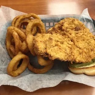 Breaded tenderloin with onion rings.