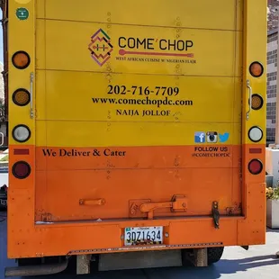 the back of a yellow truck