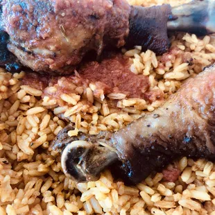 Jollof rice with grilled chicken.