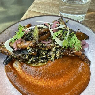 Grilled carrots with orange mole sauce
