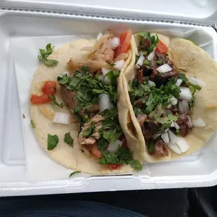 1 chicken and 1 barbacoa taco