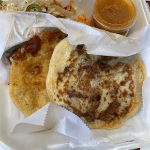 Two pupusa plate - one cheese and one bean with Curtido (cabbage slaw)