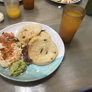 Shrimp with cheese Pupusa... with guacamole with its traditional salsa and curtido