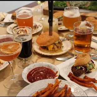 a table full of food and drinks