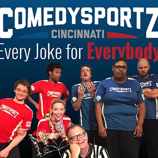 a group of people posing for a picture