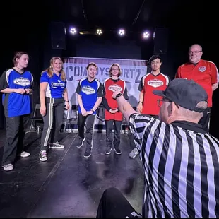 a group of people on stage