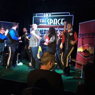 a group of people on stage