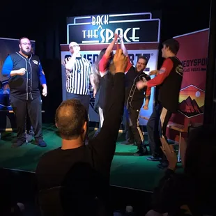 a group of people on stage