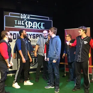 a group of men on stage