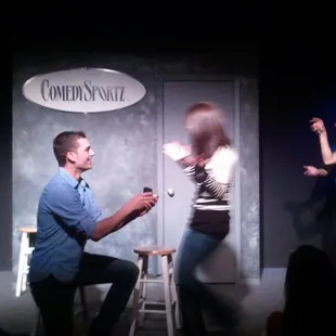 a man proposing a woman