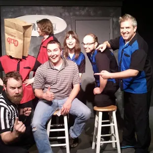 a group of people posing for a picture