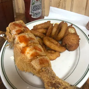 a fried fish and french fries