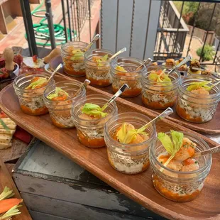 Mini shrimp and crab cocktails-cocktail sauce, garlic aioli, celery hearts, zest of lemon, chili crunch