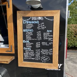 a menu on a food truck