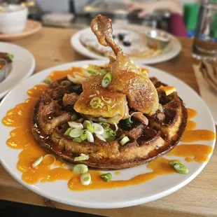 Duck &amp; Waffle (house duck confit leg, wild rice waffle, honey sriracha butter, hard boiled egg)