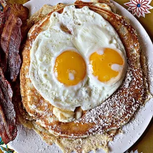 Banana Buttermilk Pancakes, bacon, and eggs