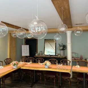 a dining room with tables and chairs