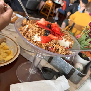 Greek yogurt with fresh strawberries, blue berries and homemade granola