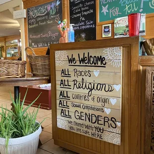 a welcome sign in a restaurant
