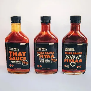 three bottles of hot sauce