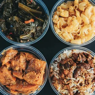 four bowls of food on a table
