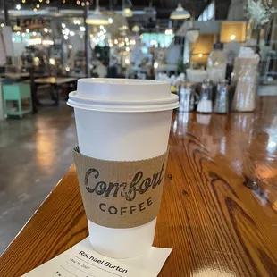 a cup of coffee on a table